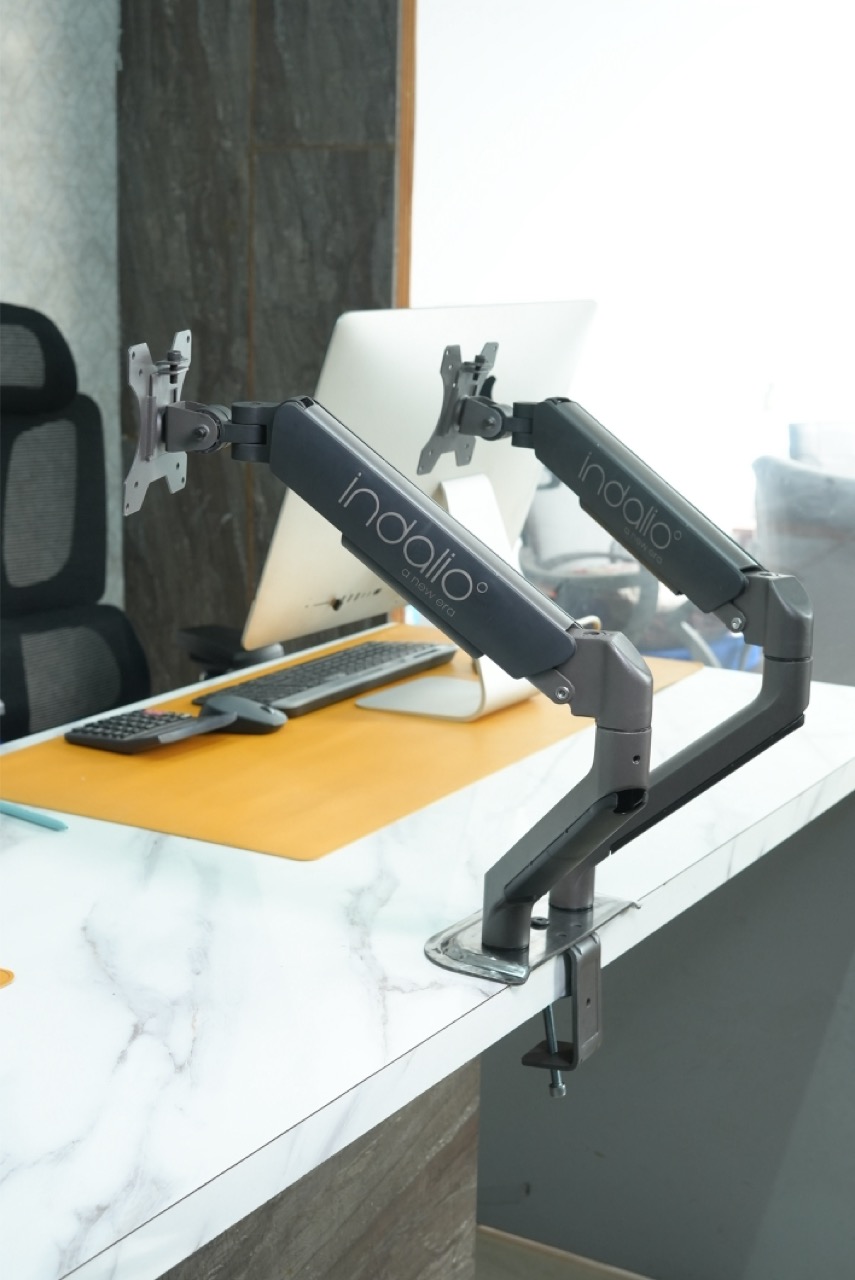 Dual monitor arm desk setup view