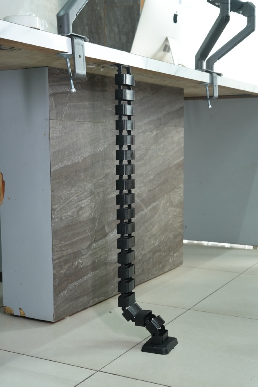 Spinal cable organizer under-desk setup view